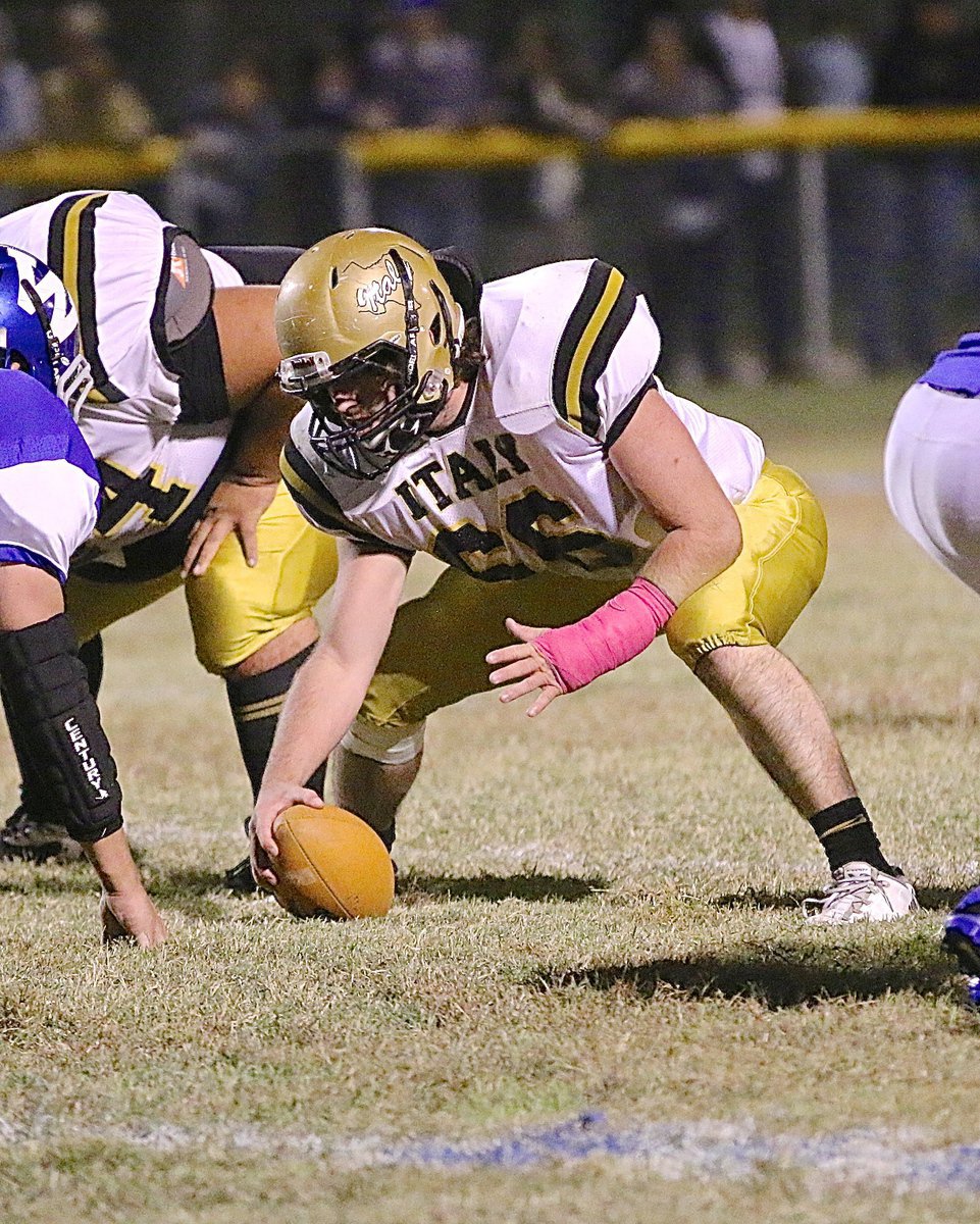 Image: Senior center Kyle Fortenberry(66) snaps for the Gladiators for his third season.