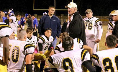 Image: After the contest, Gladiator head coach Charles Tindol congratulates his players for pulling this one out against Wortham.