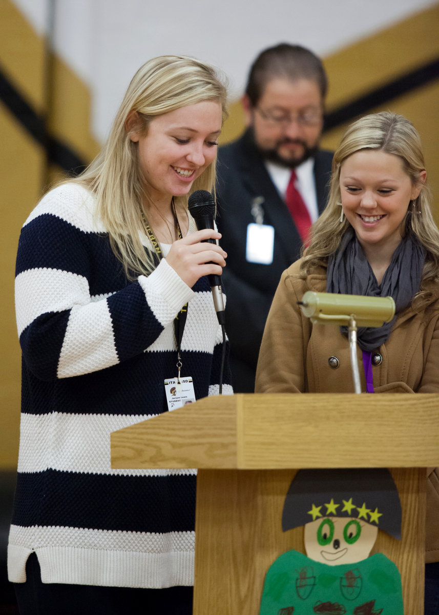 Image: Jaclynn Lewis and Bailey Eubank lead the pledges.