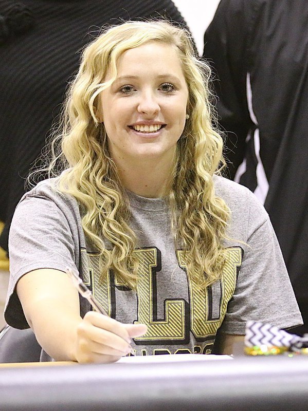Image: Italy High School’s Jaclynn Lewis signed her commitment letter this past week to play softball for Texas Lutheran University in Seguin. A senior, Jaclynn was supported by family, coaches, teammates, classmates and fans who were on hand during a ceremony held inside Italy Gladiator Coliseum.