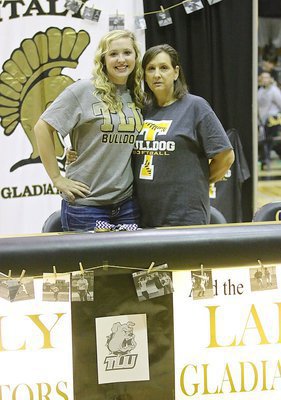 Image: Jaclynn Lewis with her mom Kelly Lewis during the commitment ceremony inside Italy Gladiator Coliseum.