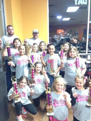 Image: Waxahachie Fall Ball League 2014 8u Champions—These cuties proudly wear “Italy” across their chests!
    Fun Fact: During their season, these little Lady Gladiators scored 117 runs against their opponent and only allowed 38 runs to be scored against them.