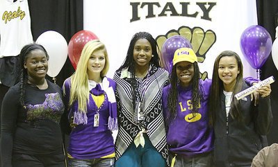 Image: Posing with some of her track teammates is Kortnei Johnson after signing her letter of intent to run track for LSU. (L-R) Taleyia Wilson, Halee Turner, Janae Robertson and April Lusk.