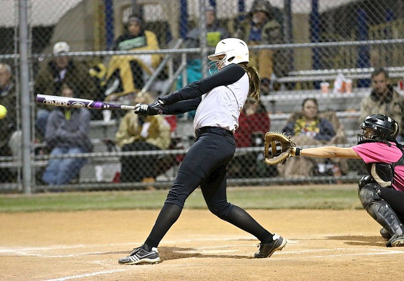 Image: Italy’s Lillie Perry tries to finish off South Grand Prairie with a mighty swing of the bat.