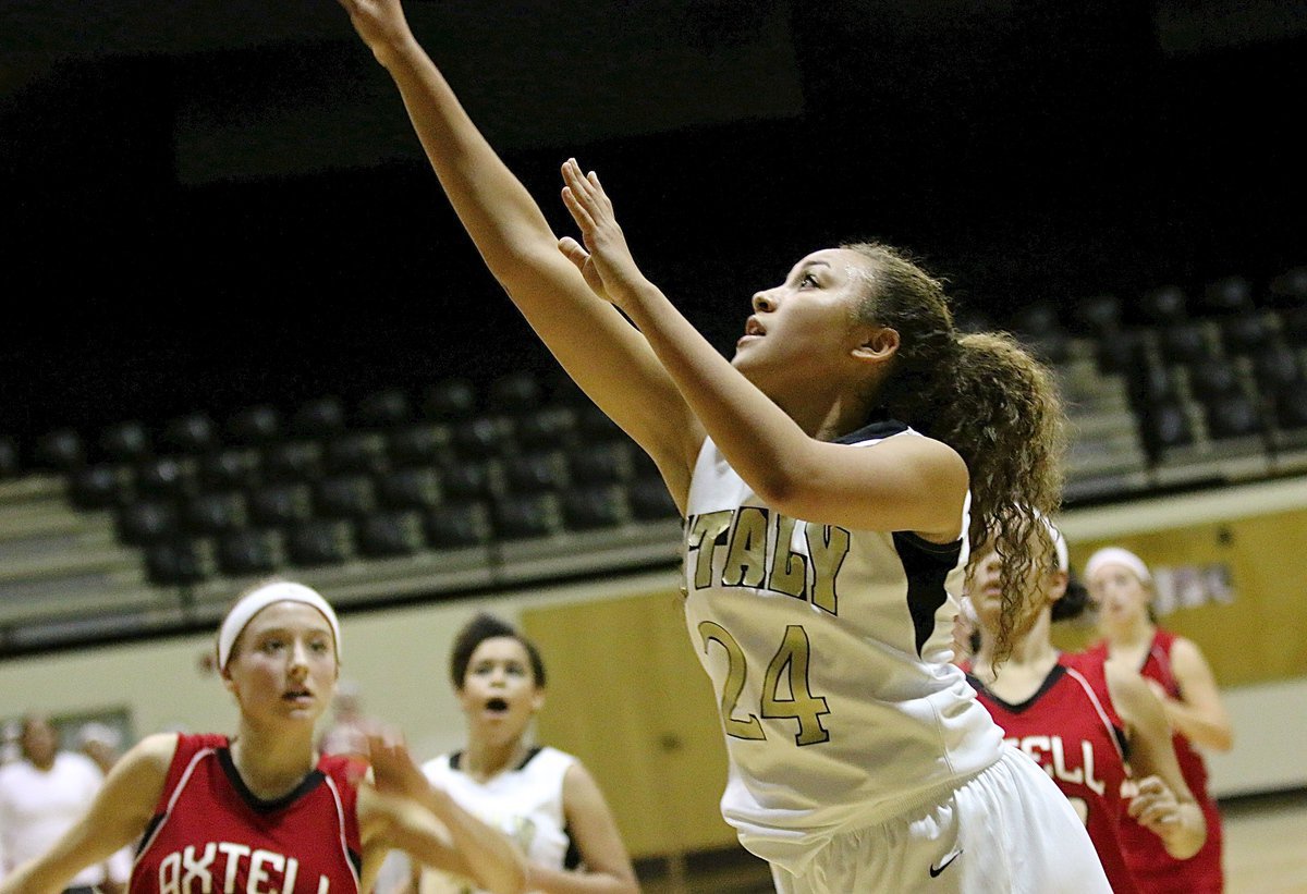 Image: Vanessa Cantu(24) scores a fast break layup late to help propel Italy past Axtell 23-21 despite the JV Lady Gladiators only having 3 players active in the game.