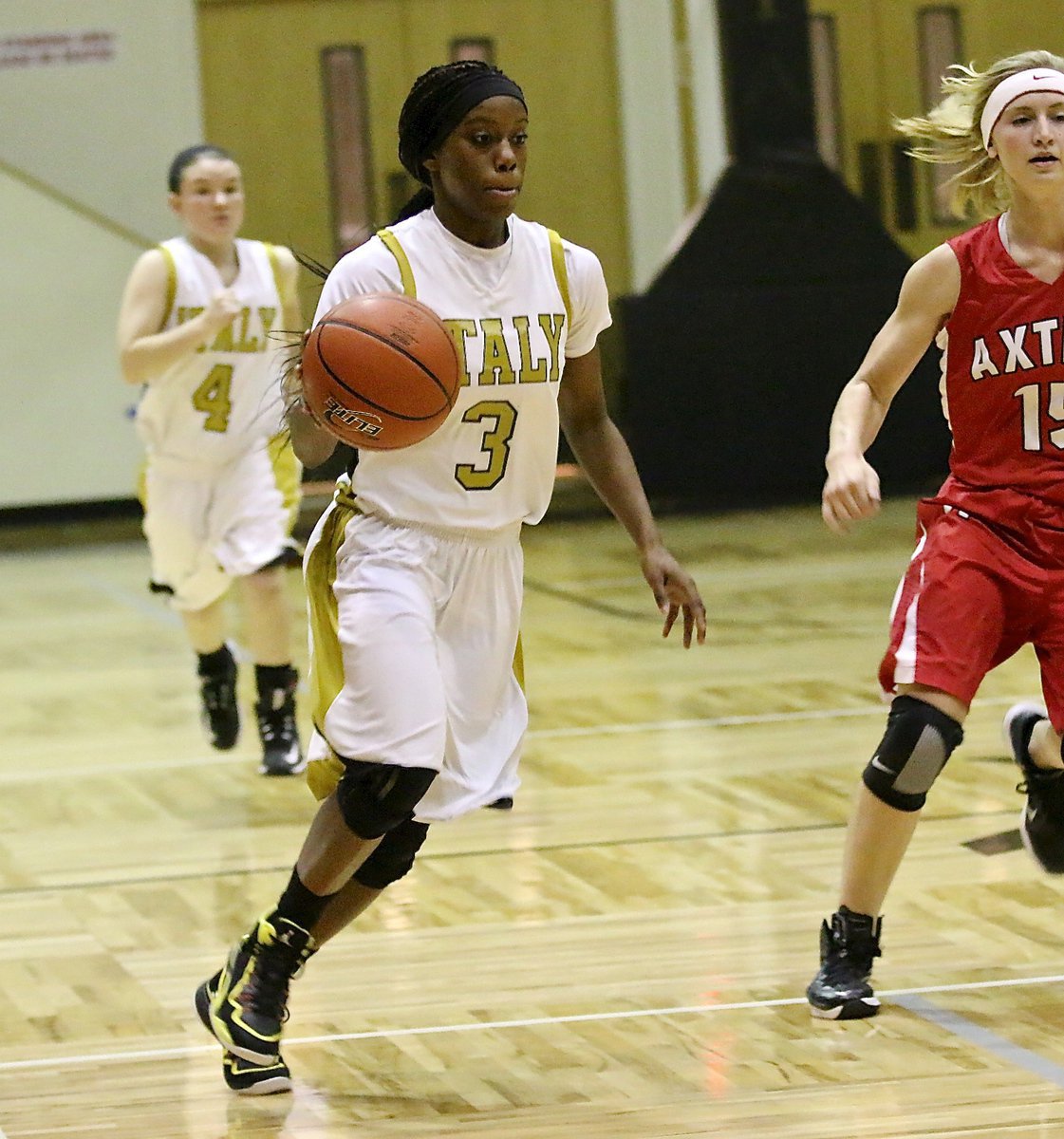 Image: Kortnei Johnson(3) charges up the floor and into the lane for an Italy basket.