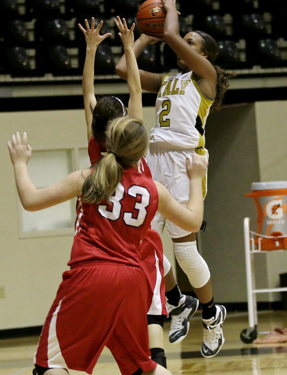 Image: Emmy Cunningham(2) rises for 2 of her game high 30-points to help Italy defeat Axtell 50-34.