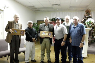 Image: Retiring board members, Howard Morgan and James Steele were honored with plaques.