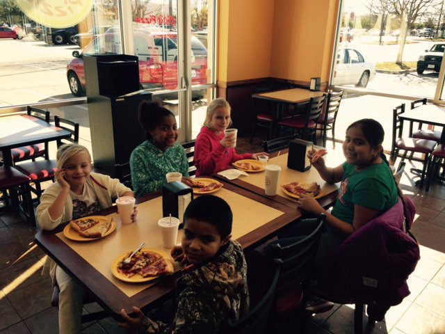 Image: The kids eating at Cici’s pizza