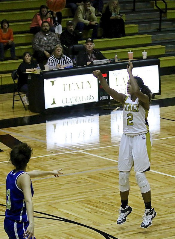 Image: Emmy Cunningham(2) knocks down a 3-pointer from the top of the key for Italy.