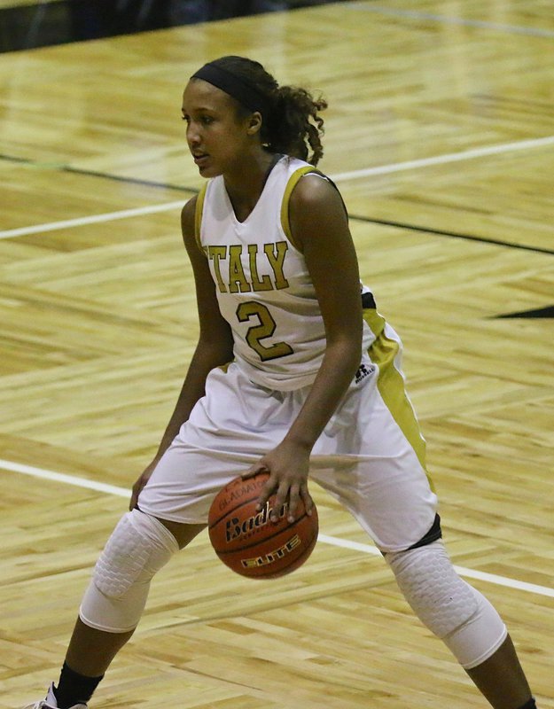 Image: Confident freshman, Emmy Cunningham(2) dribbles the ball between her legs automatically.