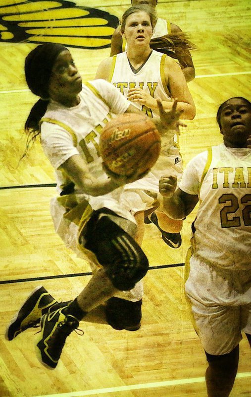 Image: It was all Lady Gladiators against Venus as Kortnei Johnson(3) drives the floor for two of her 12-points. Teammates Lillie Perry(24) and Taleyia Wilson(22) hustle into rebounding position. Italy has a powerful combination of skill, strength, speed and confidence. WE BELIEVE IN OUR LADIES!!!