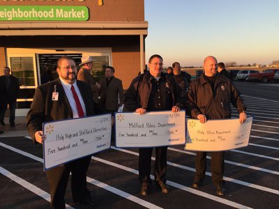 Image: $500 checks were given to the Italy School District, Milford Police Department, and Italy Police Department.