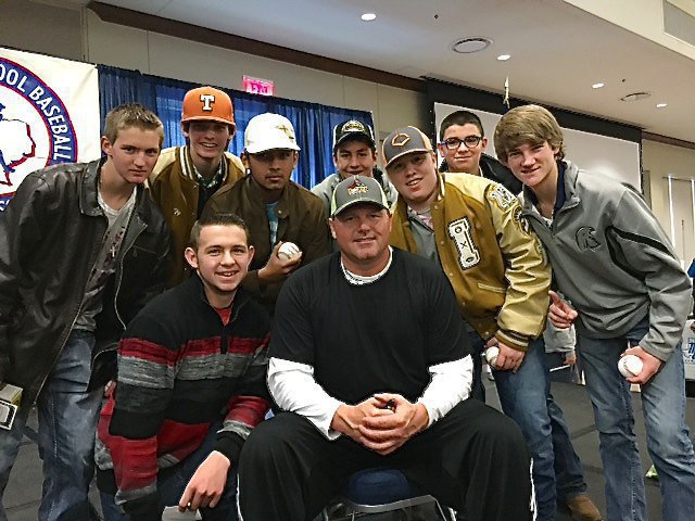 Image: 2015 Italy Gladiator Baseball players Hunter Ballard, Ty Windham, Jorge Galvan, Gary Escamilla,  J.T. Escamilla, Eli Garcia and Garett Janek, and Austin Crawford (In front) each received an autograph ball while meeting with former MLB pitching legend Roger Clemons in Waco.