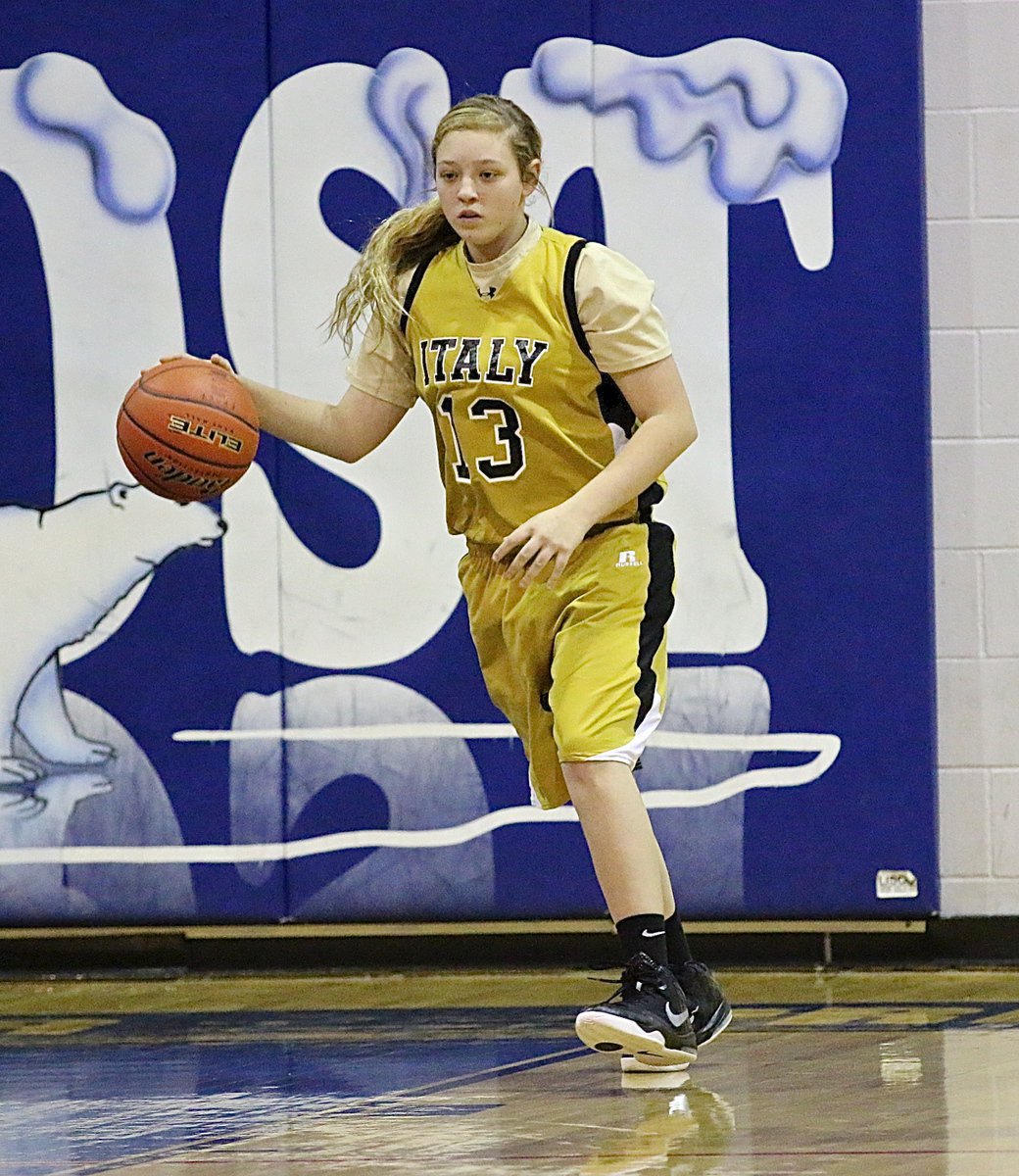 Image: Brycelen Richards(13) brings the ball up the court for the Lady Gladiators. The freshman would later put in her first three-pointer of her varsity career in the second-quarter.