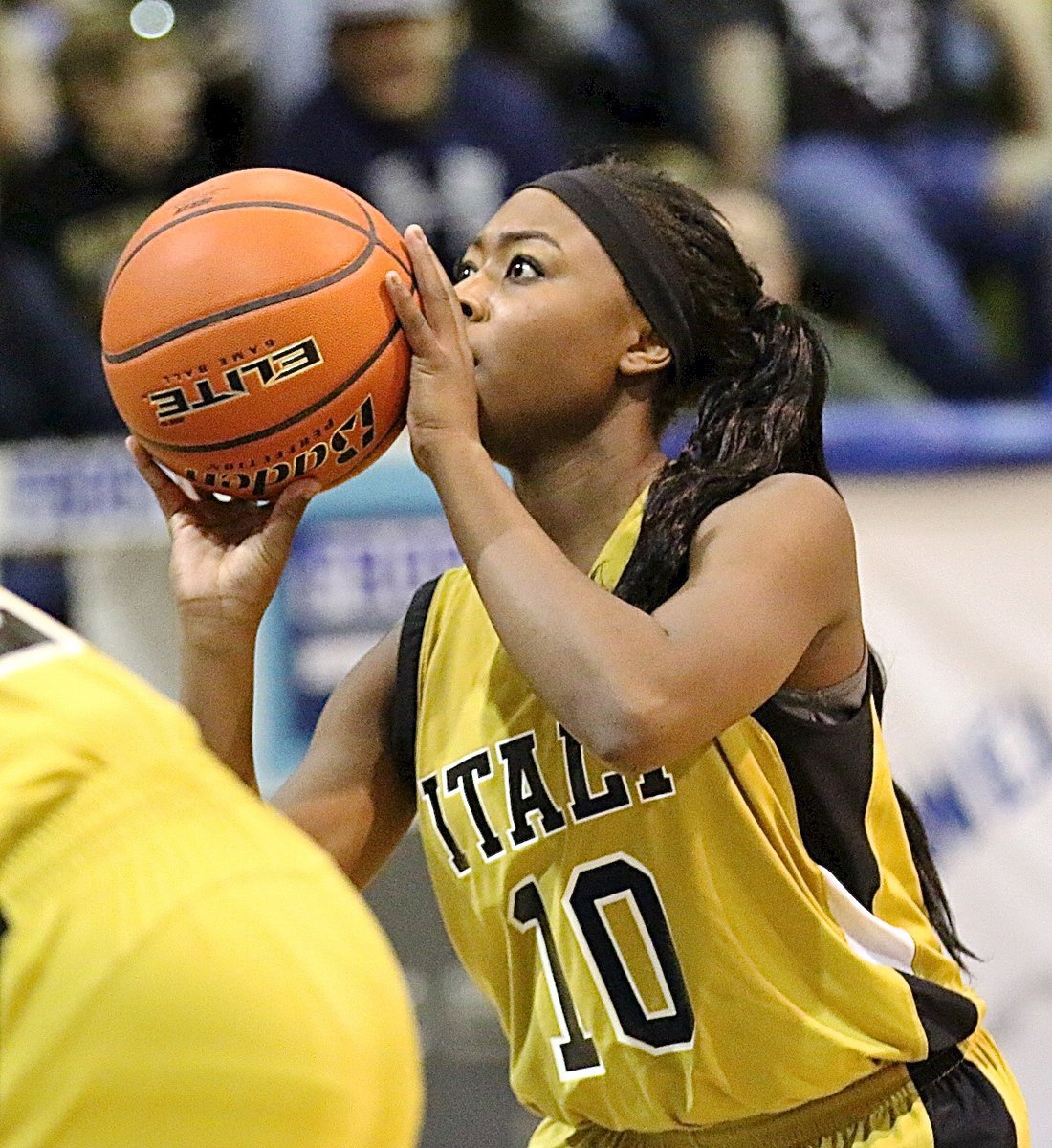 Image: Italy’s K’Breona Davis(10) puts in a freebie after being fouled during a fast break layup attempt.