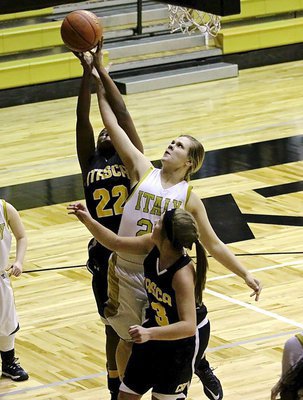 Image: Lady Gladiator Lillie Perry(24) battles for a rebound on the offensive board.