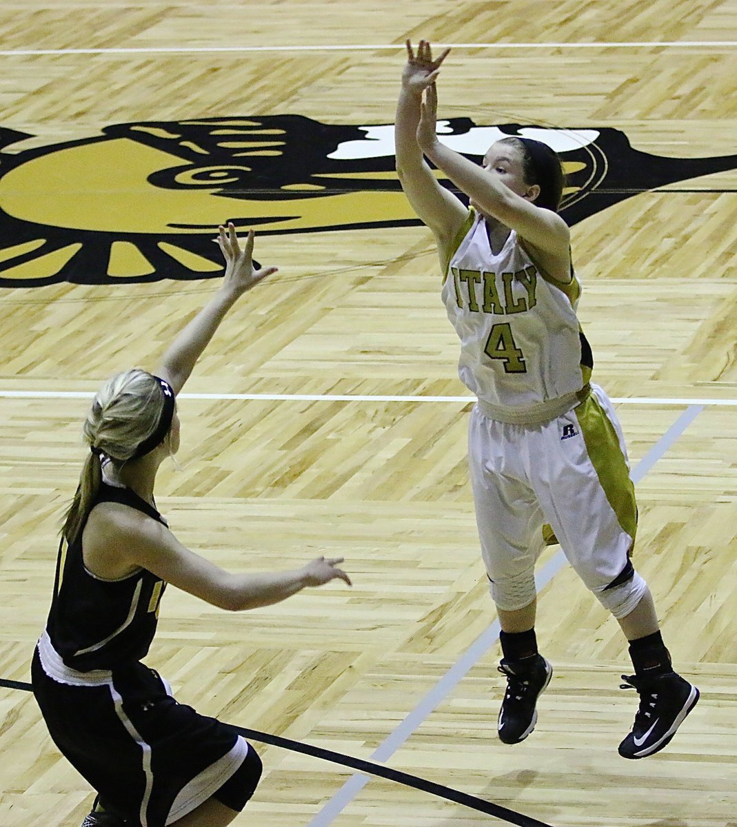 Image: Senior Lady Gladiator Tara Wallis(4) attempts a three-pointer.