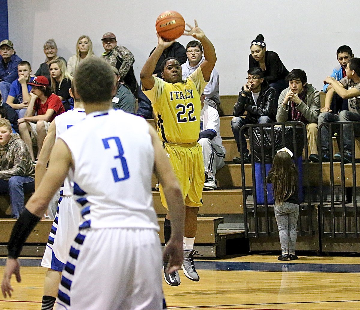 Image: Kenneth Norwood, Jr.(22) tries a jumper from way out for the Gladiators.