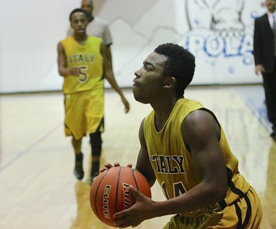 Image: Kendrick Norwood(14) pulls up from the right corner. Norwood led the Gladiators with a team high 10-points.