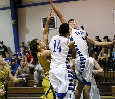 Image: Italy’s Ryan Connor(11) competes for an offensive rebound.