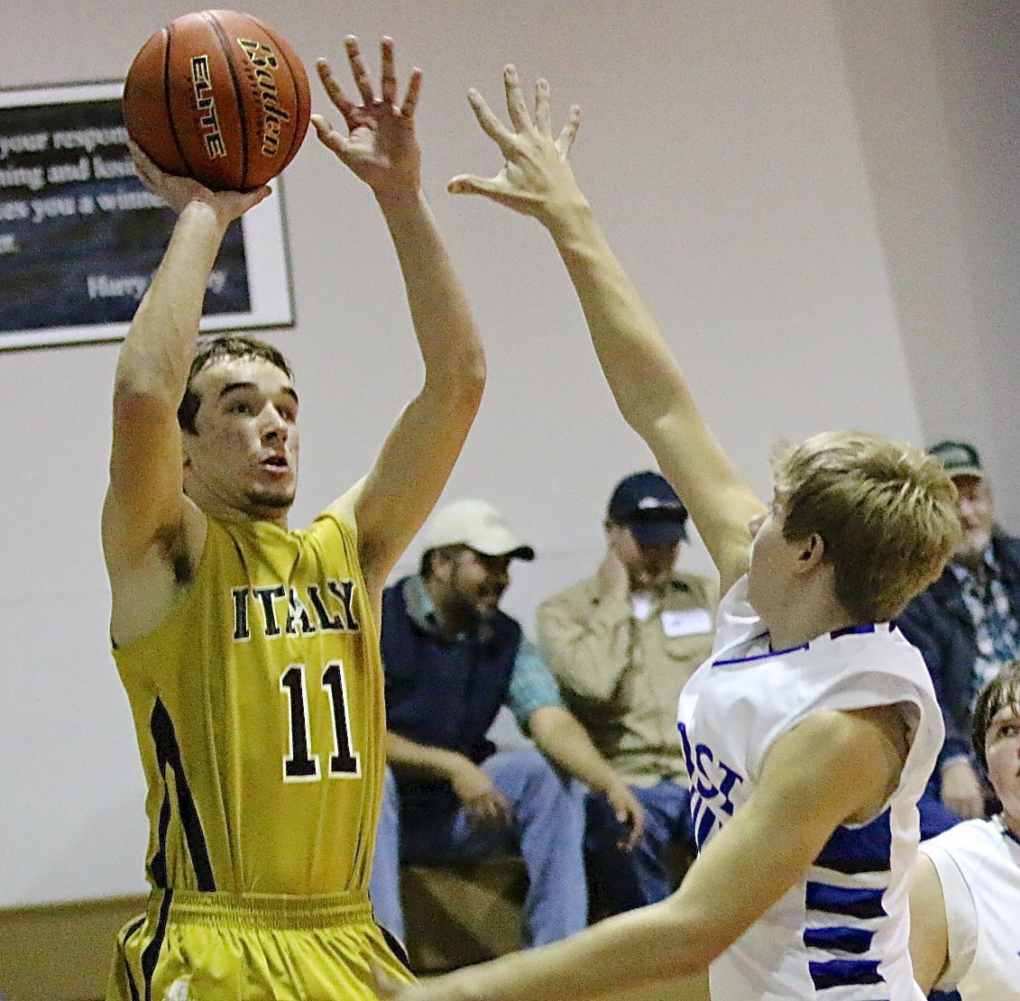 Image: Gladiator Ryan Connor(11) takes a jumper from the corner.