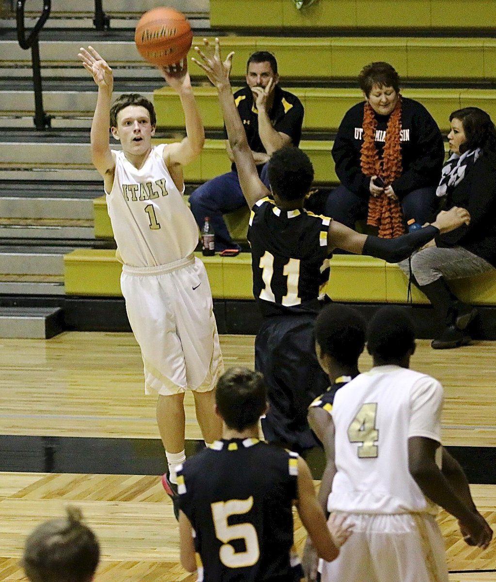 Image: Joshua Cryer(1) lets it fly over a Wampus Cat defender.