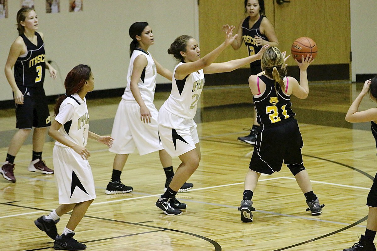 Image: T’Keyah pace(5), Vanessa Cantu(24) and Alex Minton-Felder(12) are scrappy on defense.