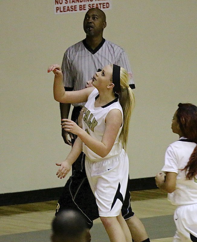 Image: Annie Perry(11) battles for the rebound.