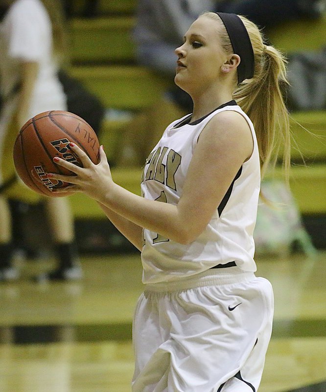 Image: JV Lady Gladiator Annie Perry(11) warms up before her team’s game against Itasca.