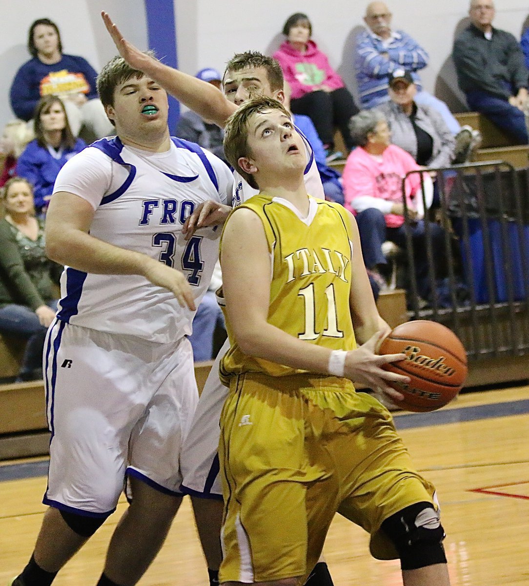 Image: JV Gladiator James Walton(11) execute a reverse layup for 2-points.