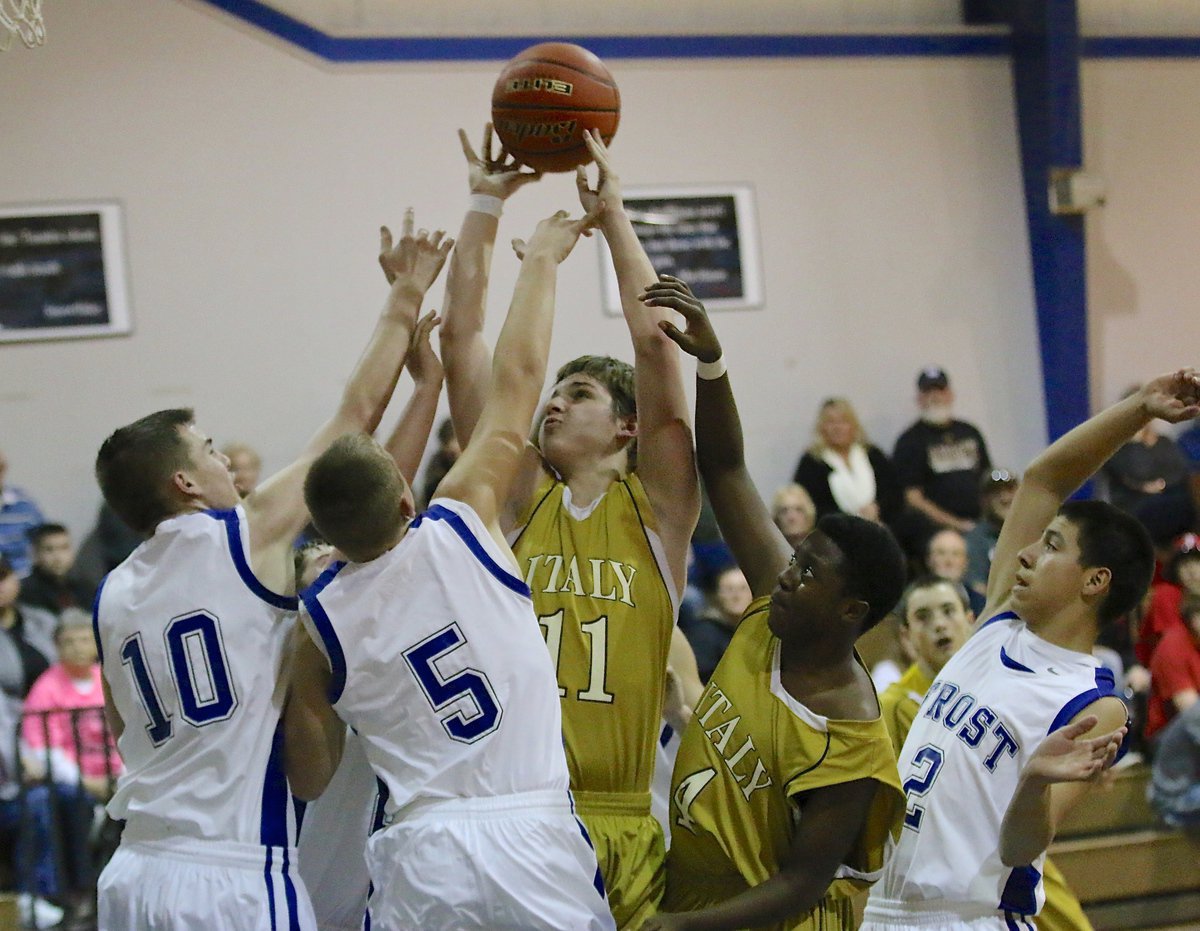 Image: Italy’s James Walton(11) goes up strong in traffic.