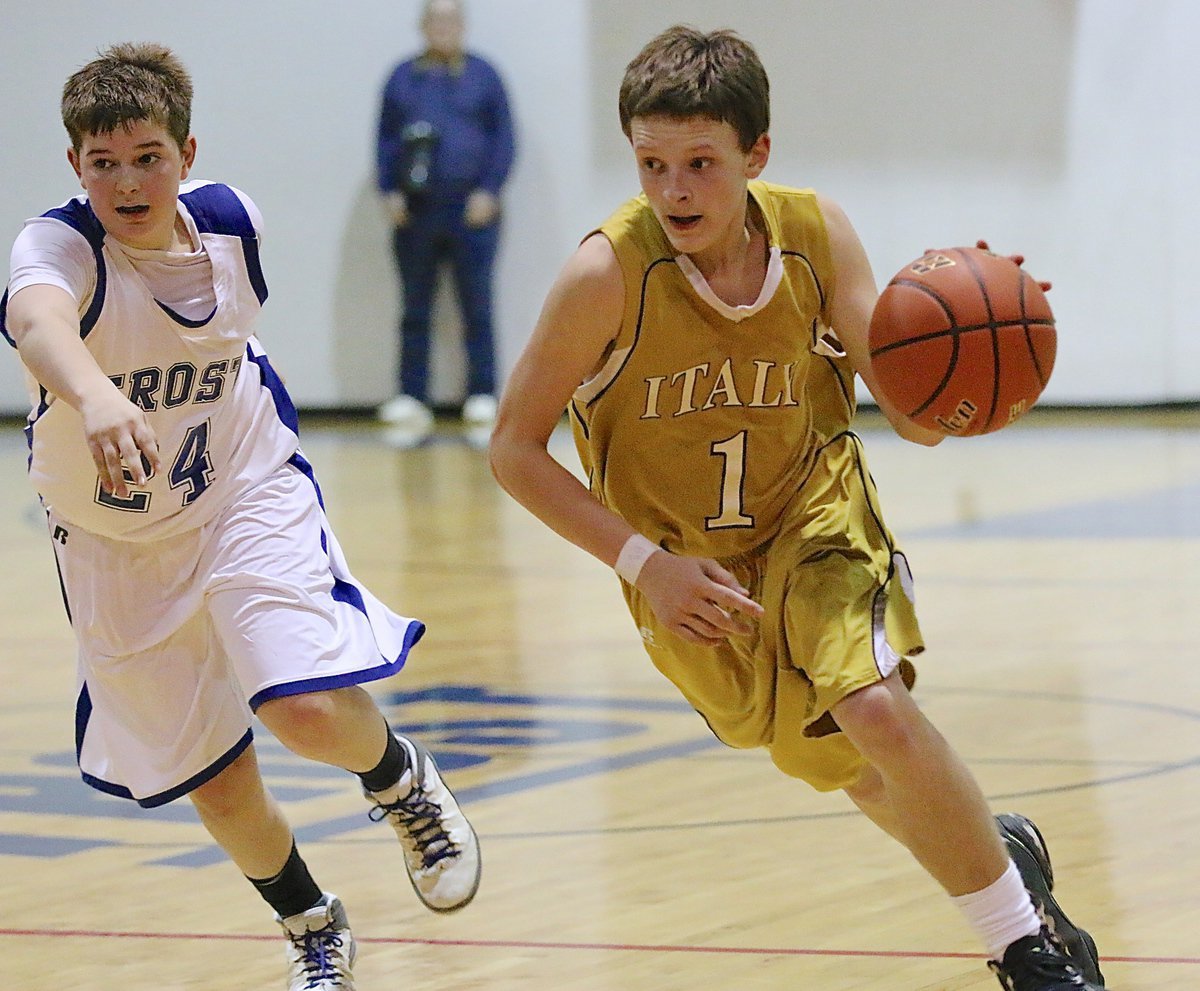 Image: Joshua Cryer(1) uses the dribble to advance Italy’s offense up the court.