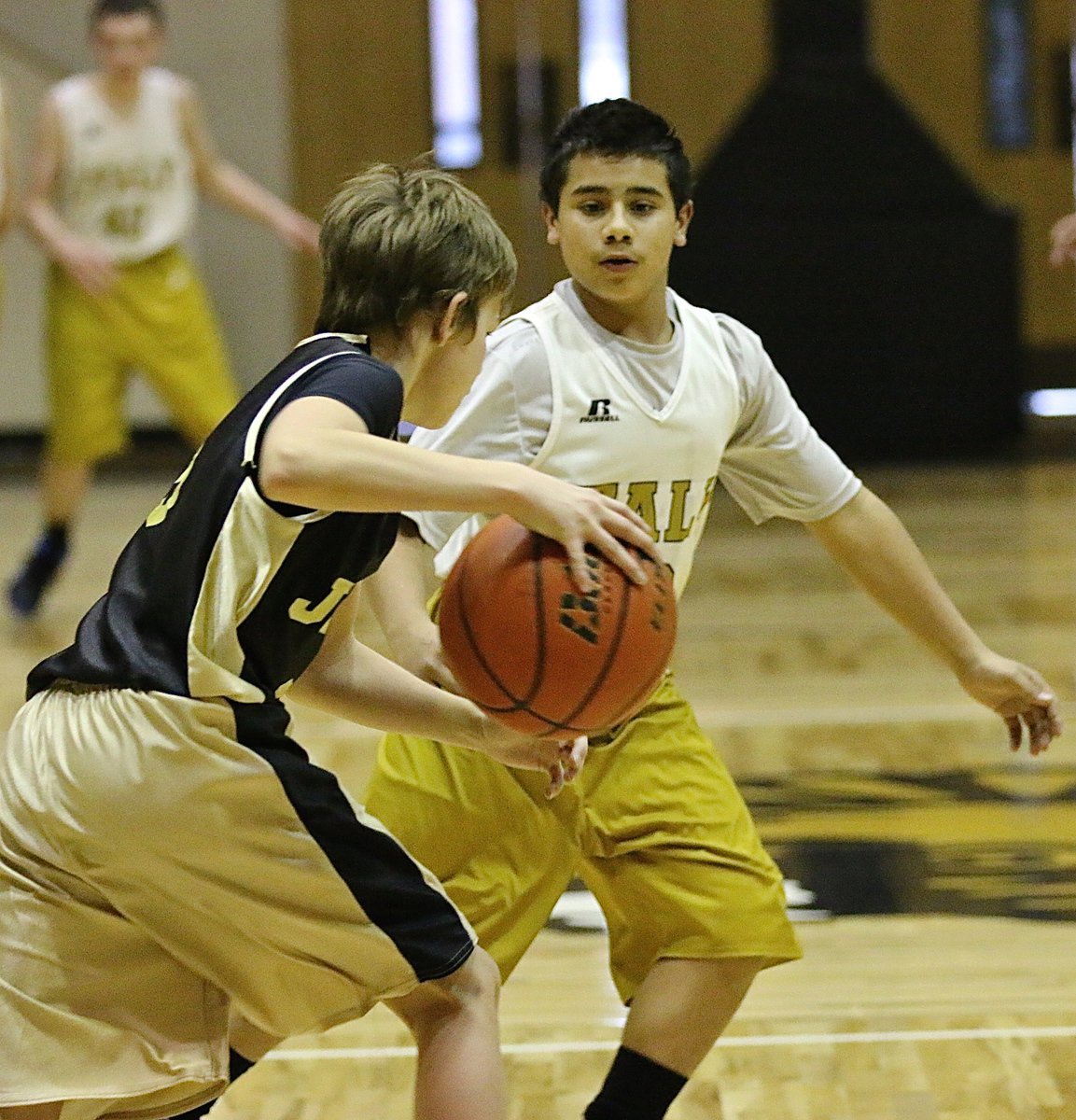 Image: Italy 7th Grader Aaron Franco (23)  applies defensive pressure against a Hubbard ball handler with both teams squaring off in the Coliseum.