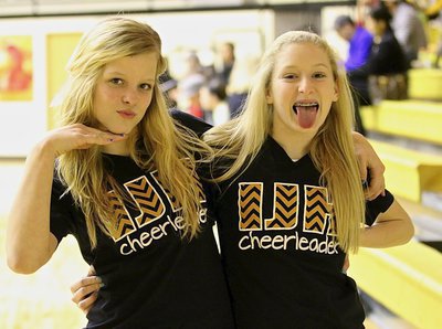 Image: Italy Jr. High Cheerleaders Alex Jones and Courtney Riddle are just having a good time supporting their teams against Hubbard.