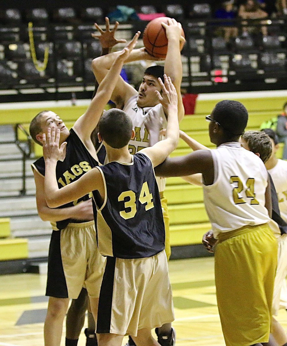 Image: 8th Grader Alex Garcia gets rolling early against Hubbard.