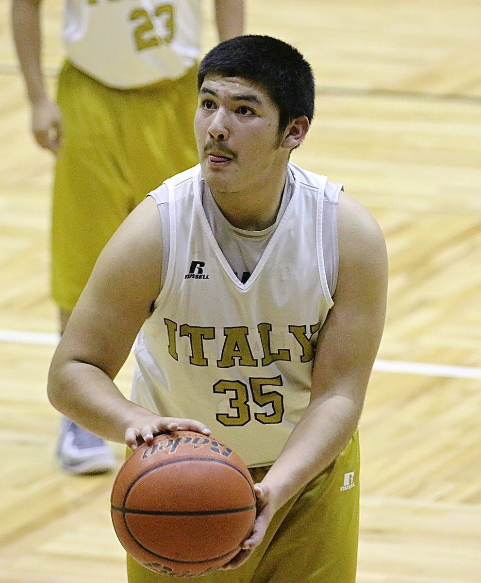 Image: Italy’s Alex Garcia(35) uses that mojo while shooting a free-throw.