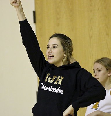Image: Italy Jr. High Cheerleader Hannah Haight helps keep the Coliseum rocking.
