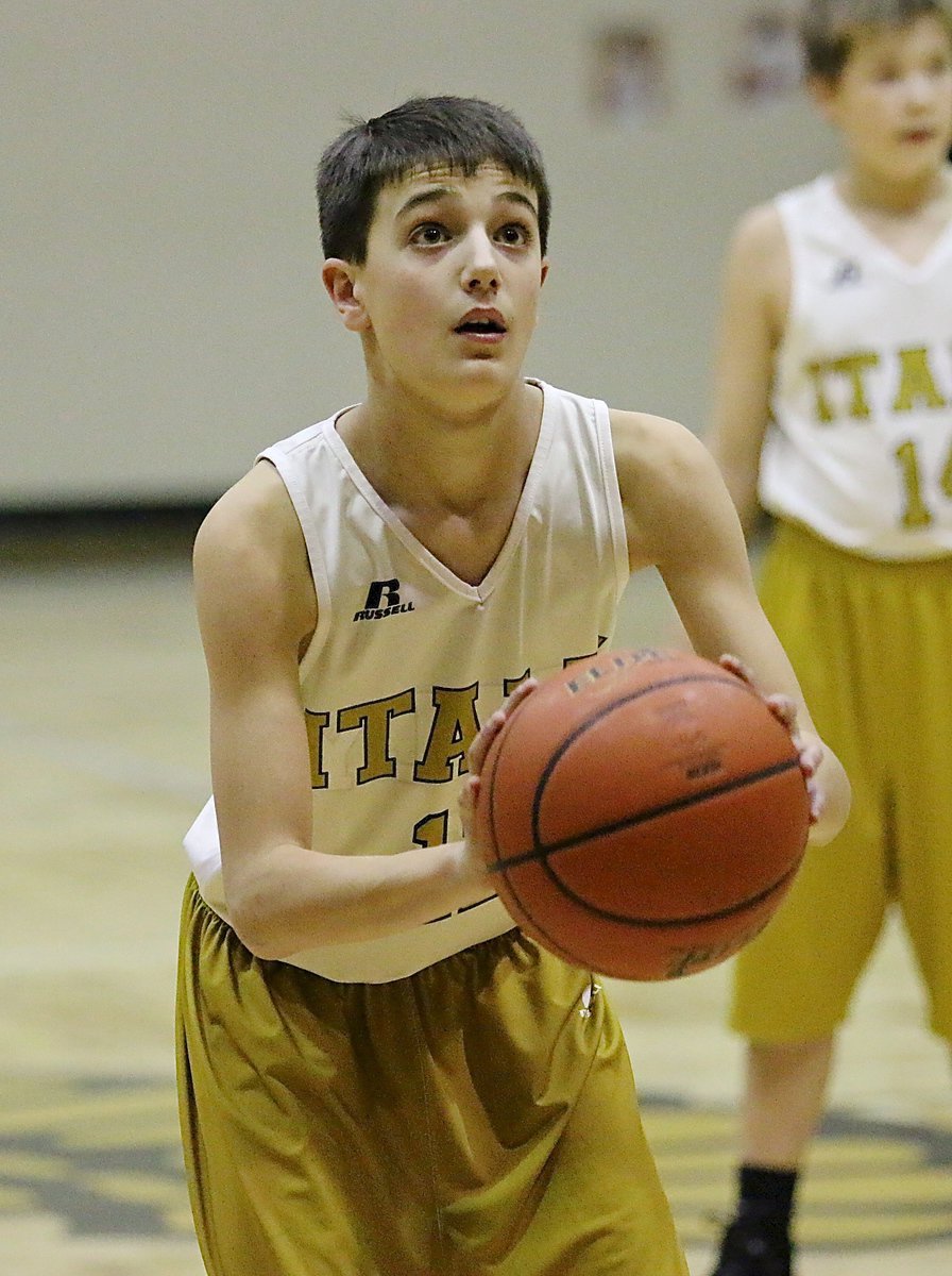 Image: Colby Hampton(12) steps to the free-throw line for Italy’s 8th Graders.