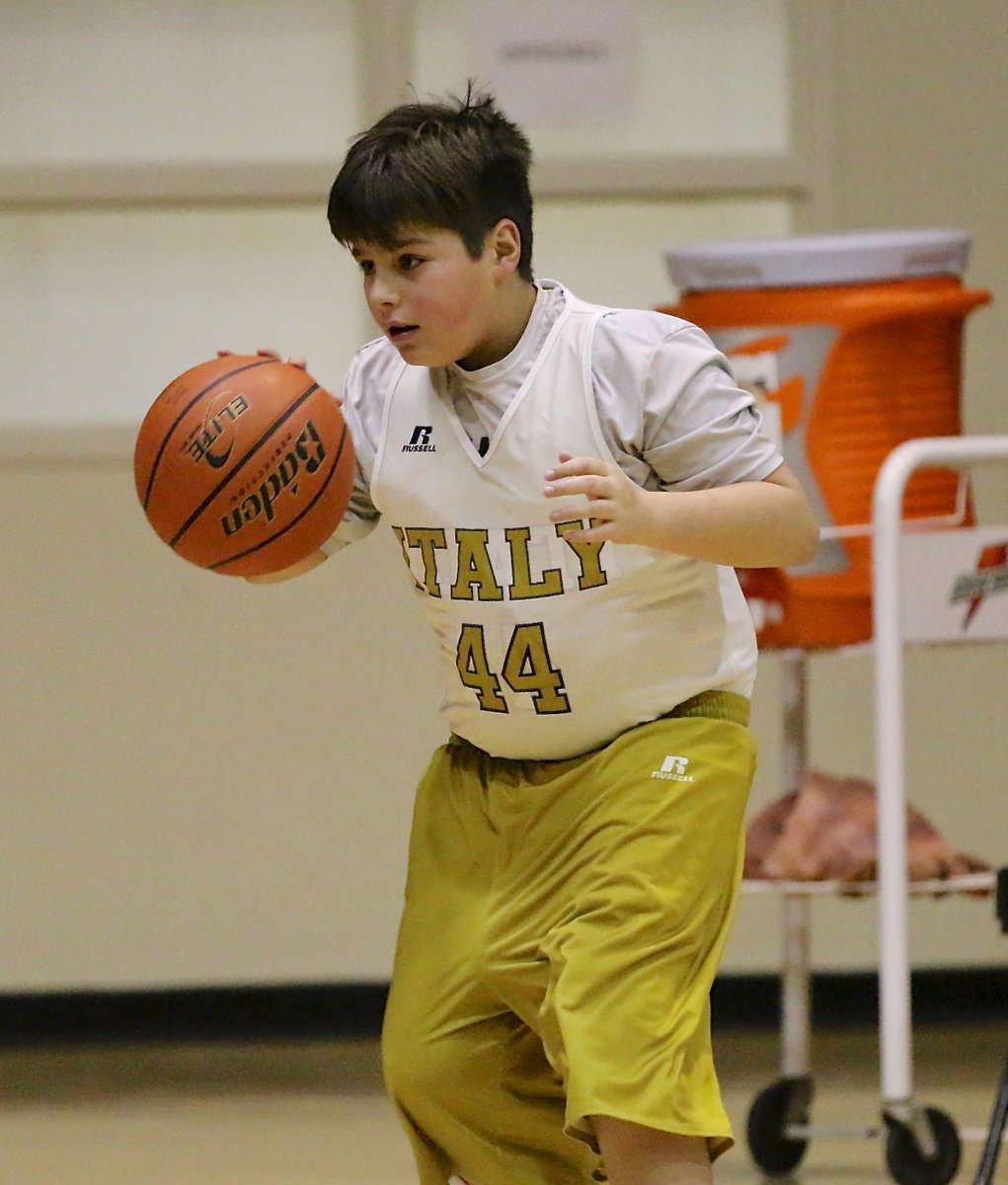 Image: Mickey South(44) makes his move toward the bucket and puts up a shot.