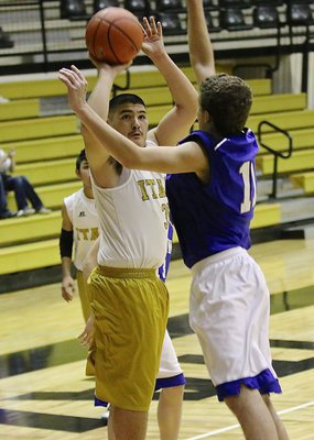 Image: Italy 8th grader Alex Garcia(35) shoots over a Blooming Grove defender in the tournament championship game.