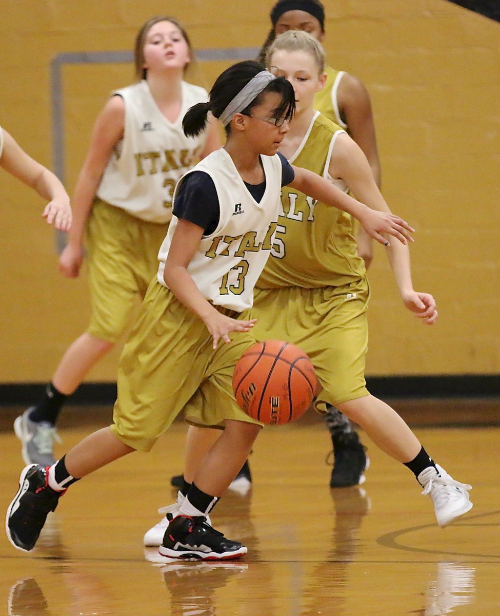 Image: Italy B guard Aliyah Turner(13) dribbles around Italy A defender Taylor Boyd (15).