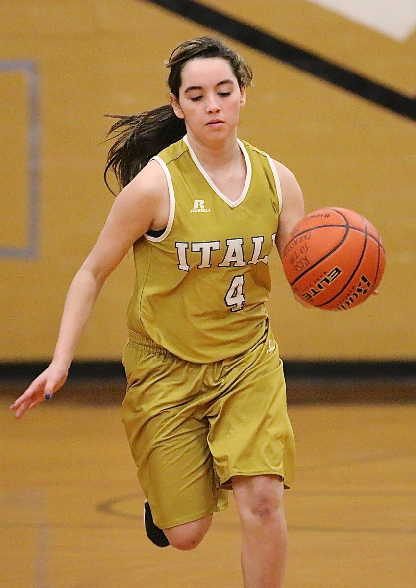 Image: Madison Galvan(4) hurries the ball up the court for the Italy A girls team.