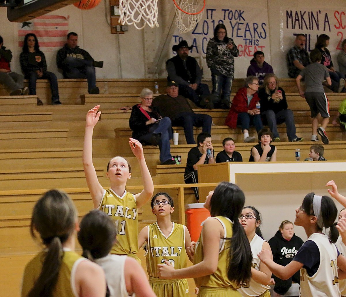 Image: Lana Beets(11) gets an open look under the basket for the Italy A team.