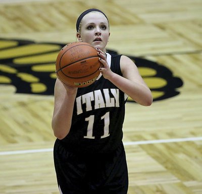 Image: JV Lady Gladiator Annie Perry(11) earns free points from the charity stripe.
