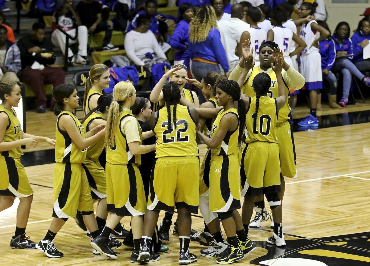 Image: The Lady Gladiators get ready for the battle against visiting Dallas Gateway Charter Academy after pre-game introductions.