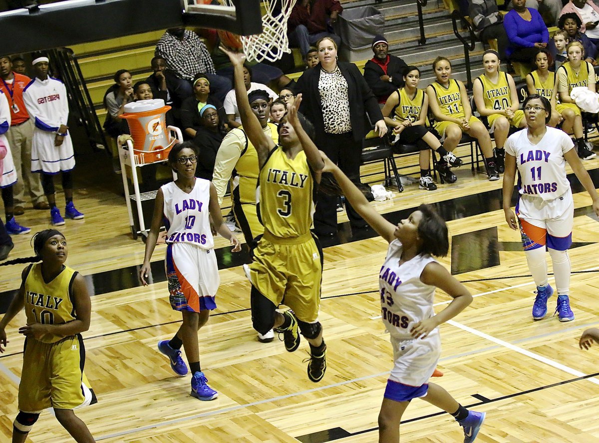 Image: Kortnei Johnson(3) helps to finish off Dallas Gateway as the Lady Gladiators improve to 3-0 in district play.