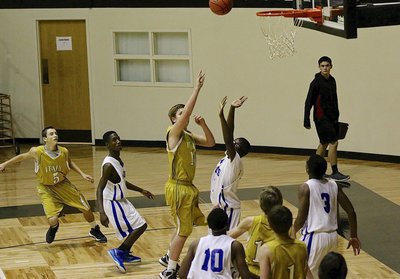 Image: Italy’s James Walton(11) led the JV Gladiators with 10-points against Dallas Gateway.