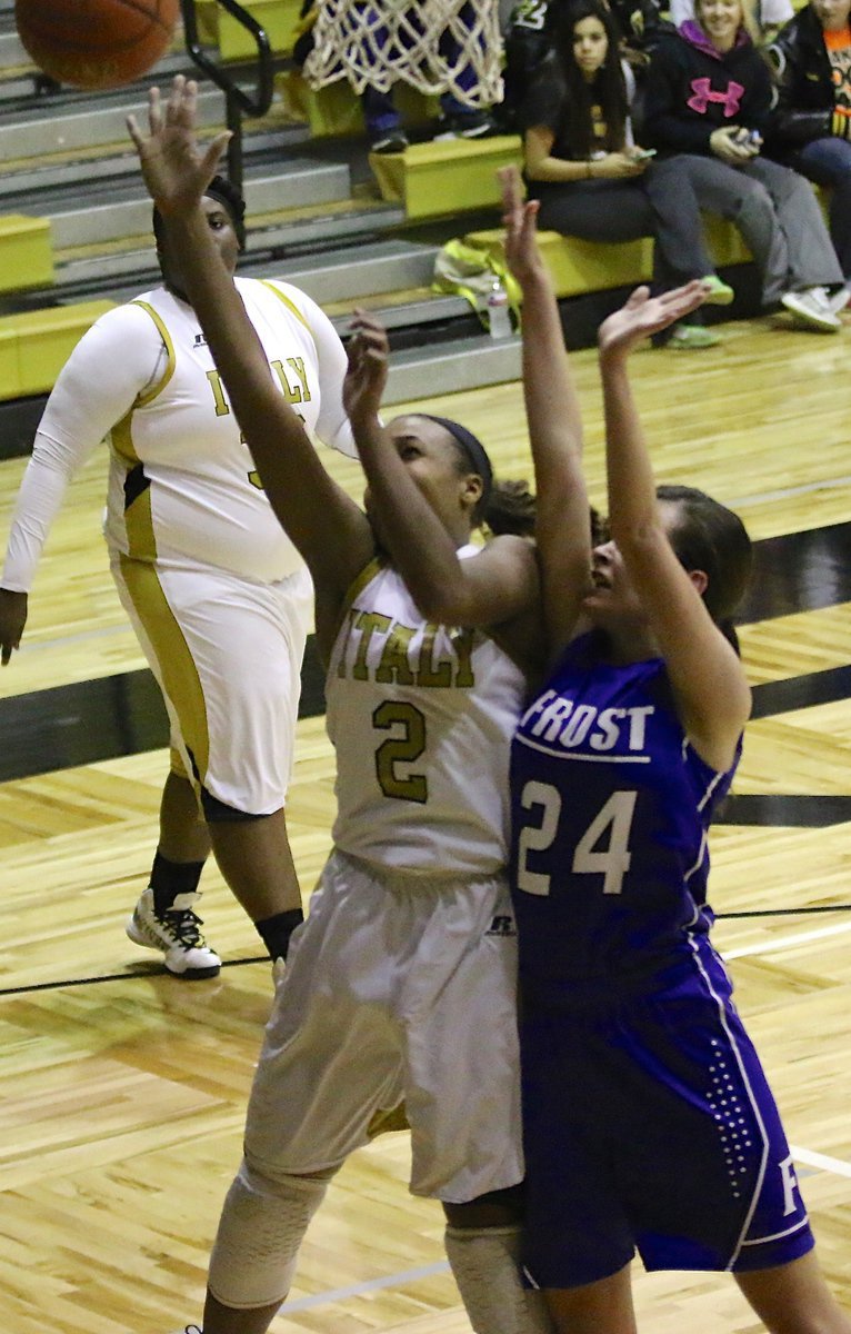 Image: Italy freshman Emmy Cunningham(2) goes up strong for 2-points in the first period.