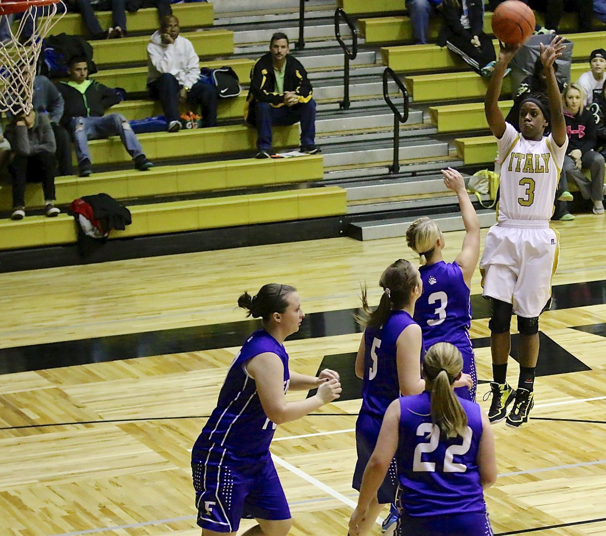 Image: Kortnei Johnson(3) pulls up from the outside with Frost packed in the lane to stop her.